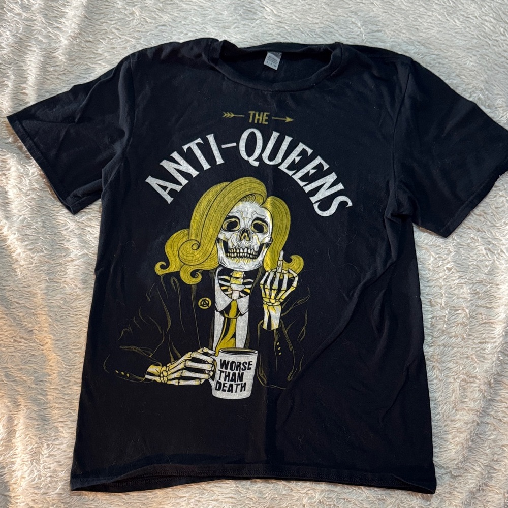 ANTI-QUEENS Black Tee with Yellow Skull Graphic and White Text